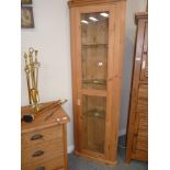 Pair of standing pine corner cupboards