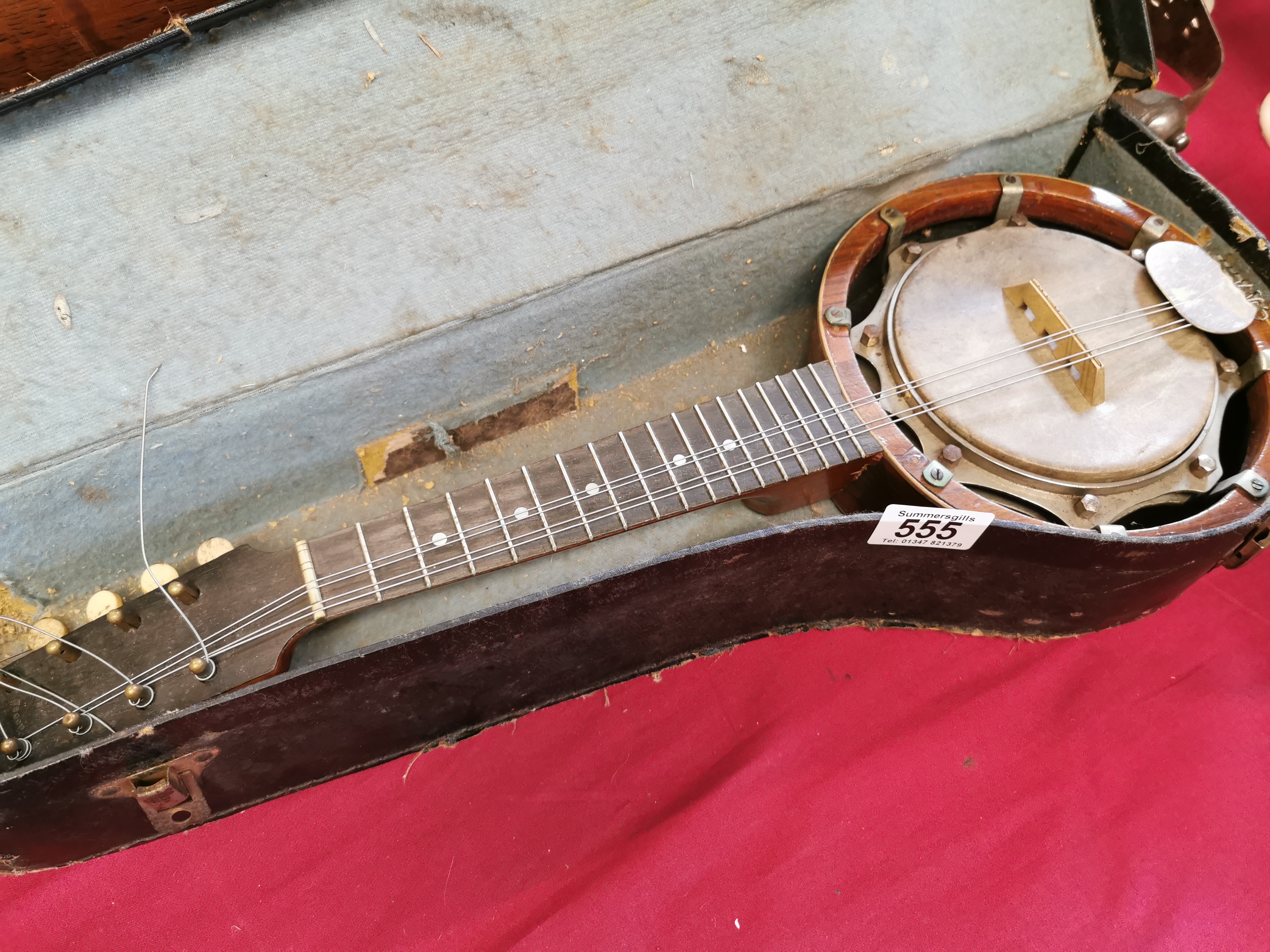 Antique mandolin by WIndsor in original case