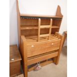 Pine open bookshelves and 2 single beds