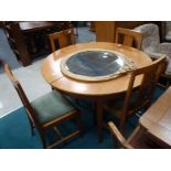 Oak extending dining table and 4 chairs
