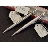 A Pair of Silver Propelling Pencils
