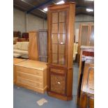 Walnut repro. Standing corner cupboard