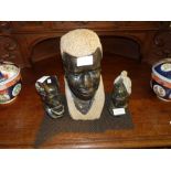 3 African marble heads