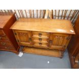 Small Ercol style oak cupboard