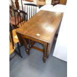 Oak barley twist drop leaf dining table