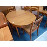 Extending teak dining table and 4 chairs