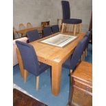 Modern light oak dining table and 8 chairs
