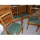 4 Acorn man dining chairs