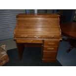 Small oak roll top desk