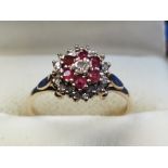 18 Diamonds plus 6 Rubies around a larger centre diamond 9ct Ring, size P