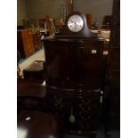 Drinks cabinet and clock