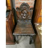 Carved oak hall chair