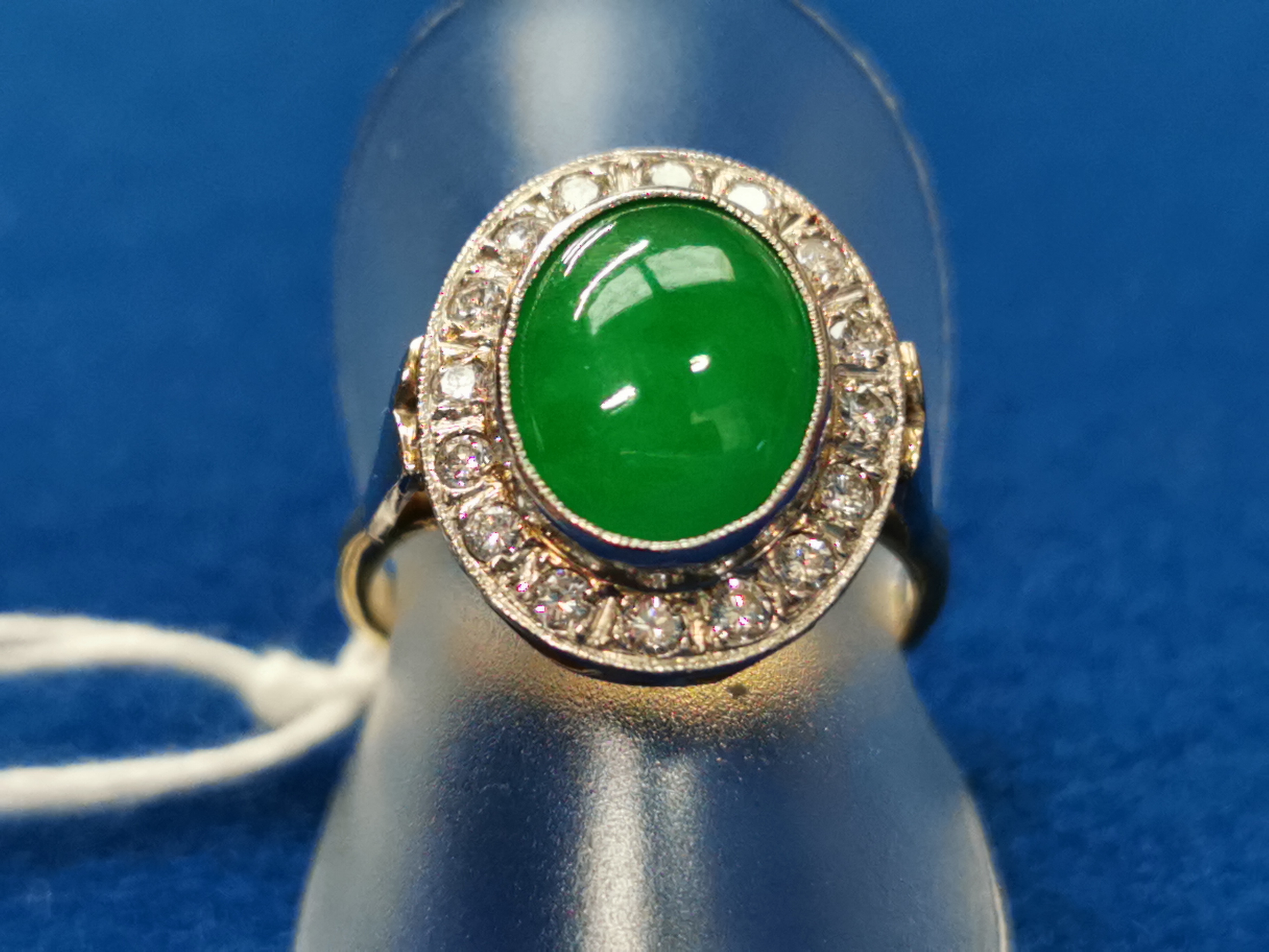 Emerald & Diamond 18ct White Gold Dress Ring featuring an oval cabochon stone, centred around 16