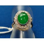 Emerald & Diamond 18ct White Gold Dress Ring featuring an oval cabochon stone, centred around 16