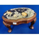 Carved 1920's Arts and Crafts Wooden Footstool with Needlework Upholstered seat 35-26 by 22cm high