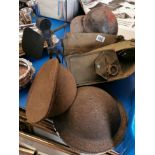 Army hat, 4 tin hats etc.