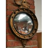 Gilt mirror with eagle decoration