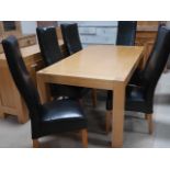 Modern light oak dining table and 6 faux leather chairs with matching sideboard