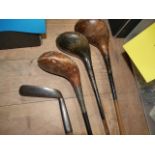 St Andrews old golf putter and 3 woods