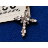 Diamond Cross Pendant on a 14ct Gold Base w/12 baguette & 9 round brilliant cut stones