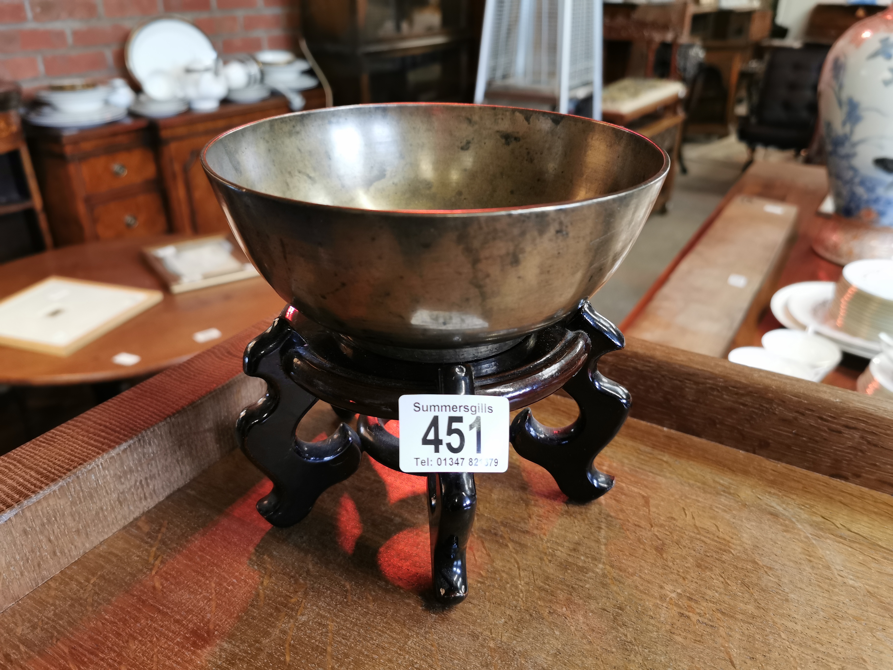 Oriental brass bowl on stand