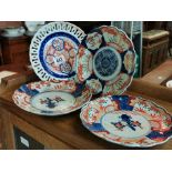 Group of four Oriental Imari plates