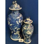 Pair of Chinese blue & white floral vases with character marks to base