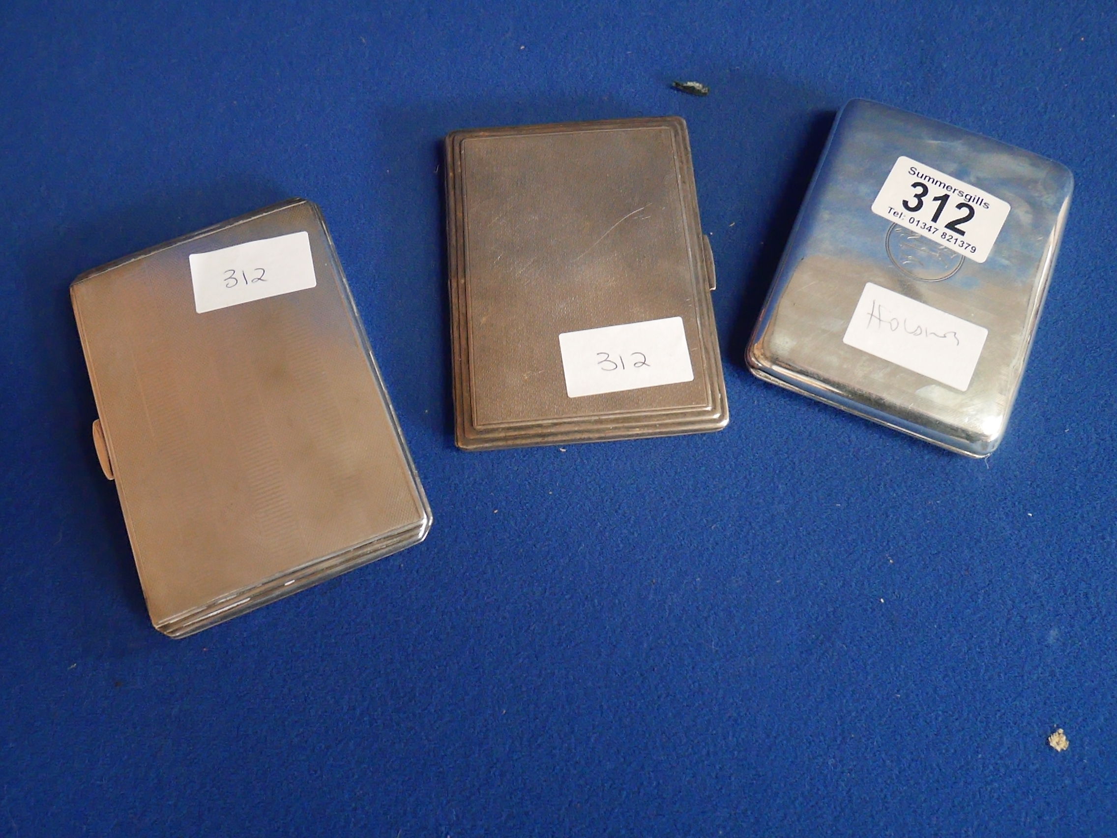 Silver cigarette cases dated Birmingham 1944, 192, 1918