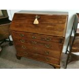 A Georgian Mahogany bureau dating from around 1770 with bracket feet and in Excellent condition