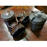 Pair of tobacco jars and porcelain feet