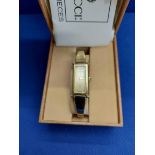 Ladies Gucci wristwatch marked on rear 1500 and with matching paperwork