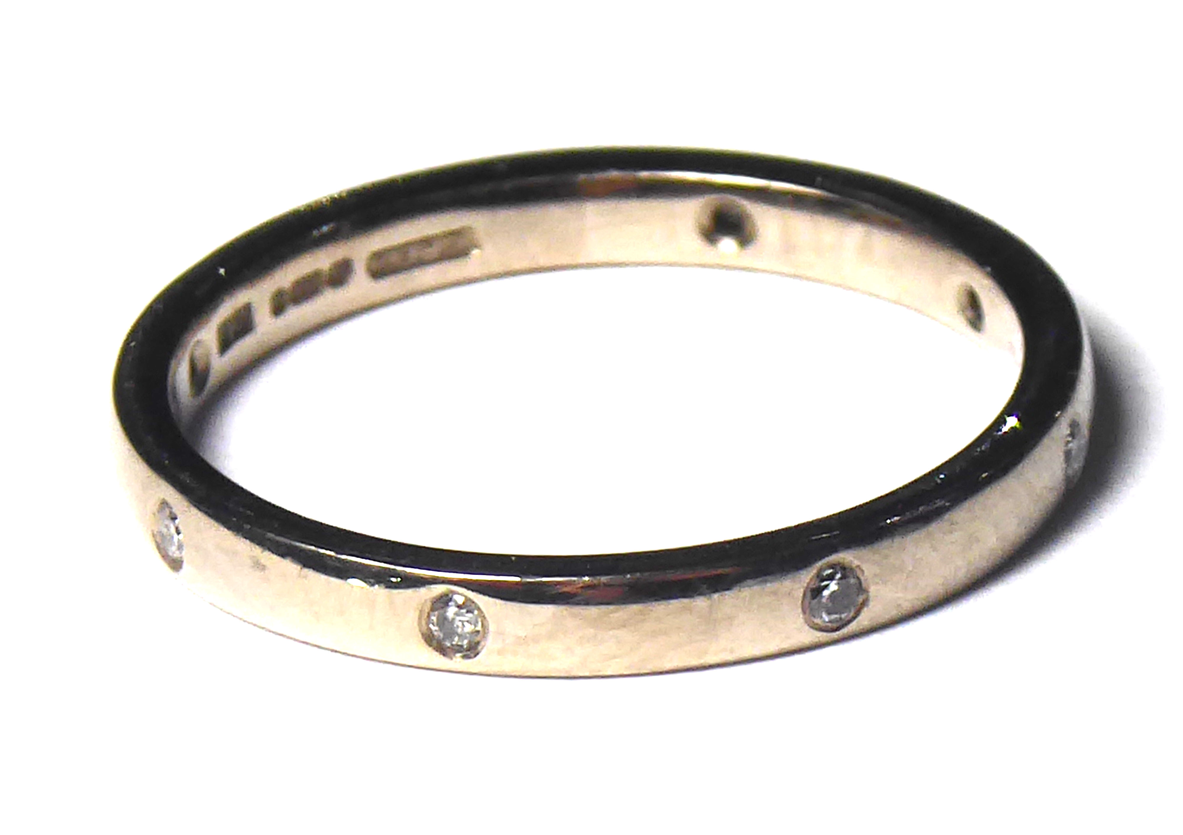 AN 18CT WHITE GOLD AND DIAMOND SET ETERNITY RING Plain form set with round cut diamonds (size L/M). - Image 2 of 2
