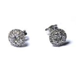 A PAIR OF 18CT GOLD AND DIAMOND STUD EARRINGS Pave set diamonds in a spherical design. (approx total