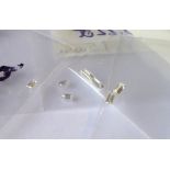 WITHDRAWN!! A COLLECTION OF LOOSE BAGUETTE CUT DIAMONDS Two 4.1mm x 2mm and three smaller.