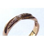 withdrawn AN 18CT GOLD AND DIAMOND CROSSOVER WEDDING BAND Having a row of graduated diamonds (size