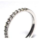 AN 18CT WHITE GOLD AND DIAMOND HALF ETERNITY RING Having a single row of round cut diamonds (size