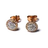 A PAIR OF 18CT GOLD AND DIAMOND STUD EARRINGS Pave set stones in a spherical design (approx total