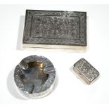 A CONTINENTAL SILVER CIGARETTE BOX AND ASHTRAY With engraved decoration, together with a Siamese box