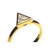 AN 18CT GOLD AND TRILLION CUT DIAMOND SOLITAIRE RING The single stone in a geometric form