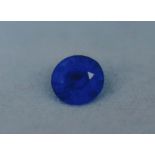 A ROYAL BLUE ROUND BRILLIANT CUT NATURAL SAPPHIRE Complete with PGTL certificate. (weight 0.72ct) (