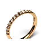 AN 18CT ROSE GOLD AND DIAMOND ETERNITY RING Having a row of round cut diamonds (size L/M).