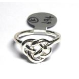 TWELVE SILVER .925 LOVE KNOT RINGS.