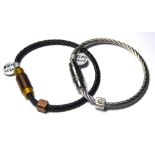 BAILEY OF SHEFFIELD, A COLLECTION OF SIX STAINLESS STEEL BANGLE BRACELETS Rope twist with