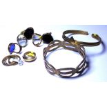 A COLLECTION OF VARIOUS KENYAN YELLOW METAL COSTUME JEWELLERY To include pendants, rings, necklaces.