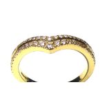 AN 18CT GOLD AND DIAMOND HALF ETERNITY RING Having two rows of round cut diamonds (size K/L).