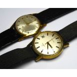 OMEGA, A GENT'S VINTAGE GOLD PLATED WRISTWATCH Having a champagne tone dial and luminous number