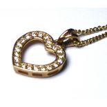 A 9CT GOLD AND DIAMOND PENDANT NECKLACE Heart form set with round cup diamonds. (approx 1cm x 1cm)