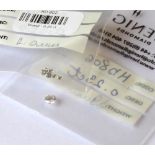 WITHDRAWN A COLLECTION OF LOOSE ROUND CUT DIAMONDS Comprising one 3.9mm and six 2.0mm stones.