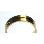 AN 18CT GOLD GENT'S WEDDING BAND Having engraved band design on planished ground (size Q).