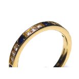 AN 18CT GOLD, SAPPHIRE AND DIAMONDS HALF ETERNITY RING Having four round cut sapphires